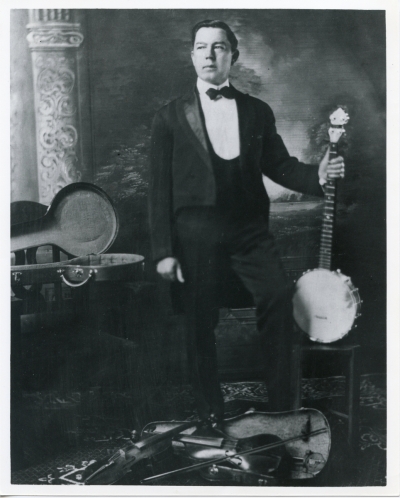Bascom Lamar Lunsford was born in Madison County, North Carolina in 1882. He grew up in a community that was rich in folk music and culture and in a family that shared in this appreciation. Known as “The Minstrel of the Appalachians”, Lunsford enjoyed performing and was quite accomplished. His true calling and lifelong mission, however, was to preserve and promote mountain music, dance, and culture. He championed mountain culture to the outside world, shining a light on its true worth and was a pioneer in providing a platform for it to be enjoyed by a wider audience. He gave Pete Seeger his first banjo lesson, he performed before 10,000 at Madison Square Garden, he wrote the standard “Good Old Mountain Dew”, his music influenced Bob Dylan and Robert Plant but it was his mountain culture that he chose to treasure most. While there were many highlights in Bascom’s musical career, there is one in particular he treasured most. In 1939, he performed at the White House for President Franklin and First Lady Eleanor Roosevelt and the King and Queen of England.