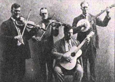 In 1926, talent scout Frank Walker recorded a group of musicians from the Atlanta area that have since been declared “Country Music’s First Supergroup”. Walker took the ever popular Gid Tanner from Dacula, Riley Puckett from Alpharetta, Clayton McMichen from Altoona and Fate Norris from the Dalton area, and dubbed them “The Skillet Lickers”. Each member filled a very important role in the group. Gid Tanner was the “cut up” or the entertainer of the group. McMichen was the polished musician while Puckett was considered a singer’s singer. Norris kept the rhythm steady. Other musicians such as Lowe Stokes, Bert Layne, Ted Hawkins and Gordon Tanner contributed to their early success, as well. The Skillet Lickers seemed to have struck a nerve with rural Americans. They recorded songs that were already known, many of which were already in public domain. The Skillet Lickers performed and recorded those old songs with an all-new energy that no one, even to this day, could match. For five years, the Skillet Lickers proved to be one of Frank Walker and Columbia Records’ biggest success stories for their “rural” or “hillbilly” classification of music. Their success also had an influence on other legendary musicians like Jimmie Rodgers, Roy Acuff, Bob Wills, Merle Travis, Hank Williams and many others.