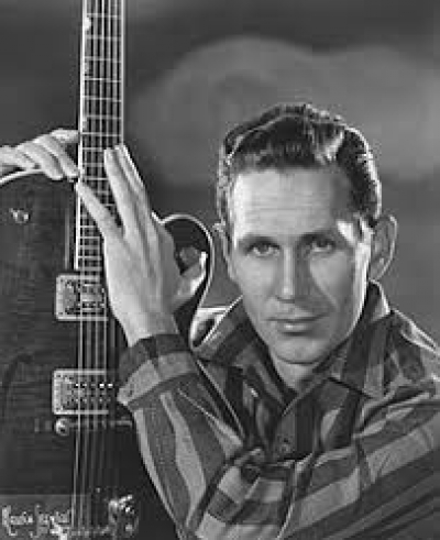 Chester Burton Atkins, nicknamed by throngs of fans as “Mister Guitar,” changed the world of guitar music, developing and elevating an innovative guitar playing style that has inspired scores of musicians. His style and sound are often duplicated but no one has completely captured the sound of Chet. He admired and was influenced by Merle Travis, Les Paul and Django Reinhardt. Working his way from low paying radio gigs to success in the business world at RCA Nashville, he discovered and signed many talented artists of his time. As one of the most prolific record producers of all times he was a driving force in the development of what was dubbed “the Nashville Sound.”